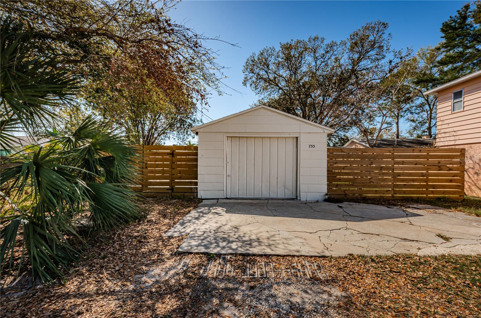 Detached garage on alley side. This space could be turned into an ADU.  Room to park your RV or boat.