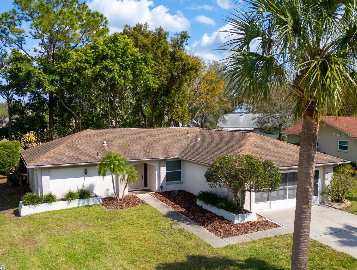 Perfect location - Walking distance to the Highland Lakes clubhouse or ride your golf cart the short distance to the Lodge on Lake Tarpon~