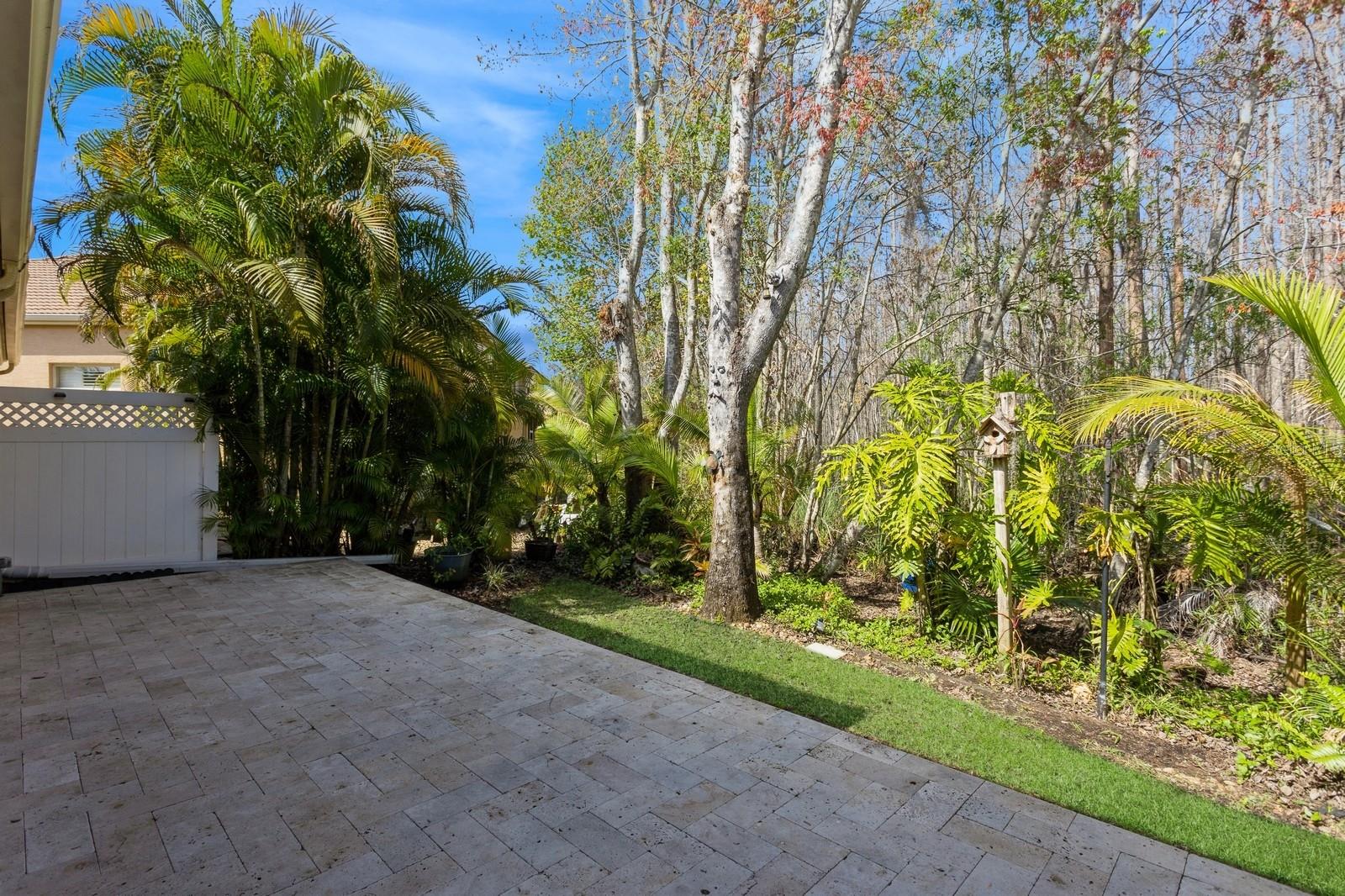 Extended deck w/ travertine pavers