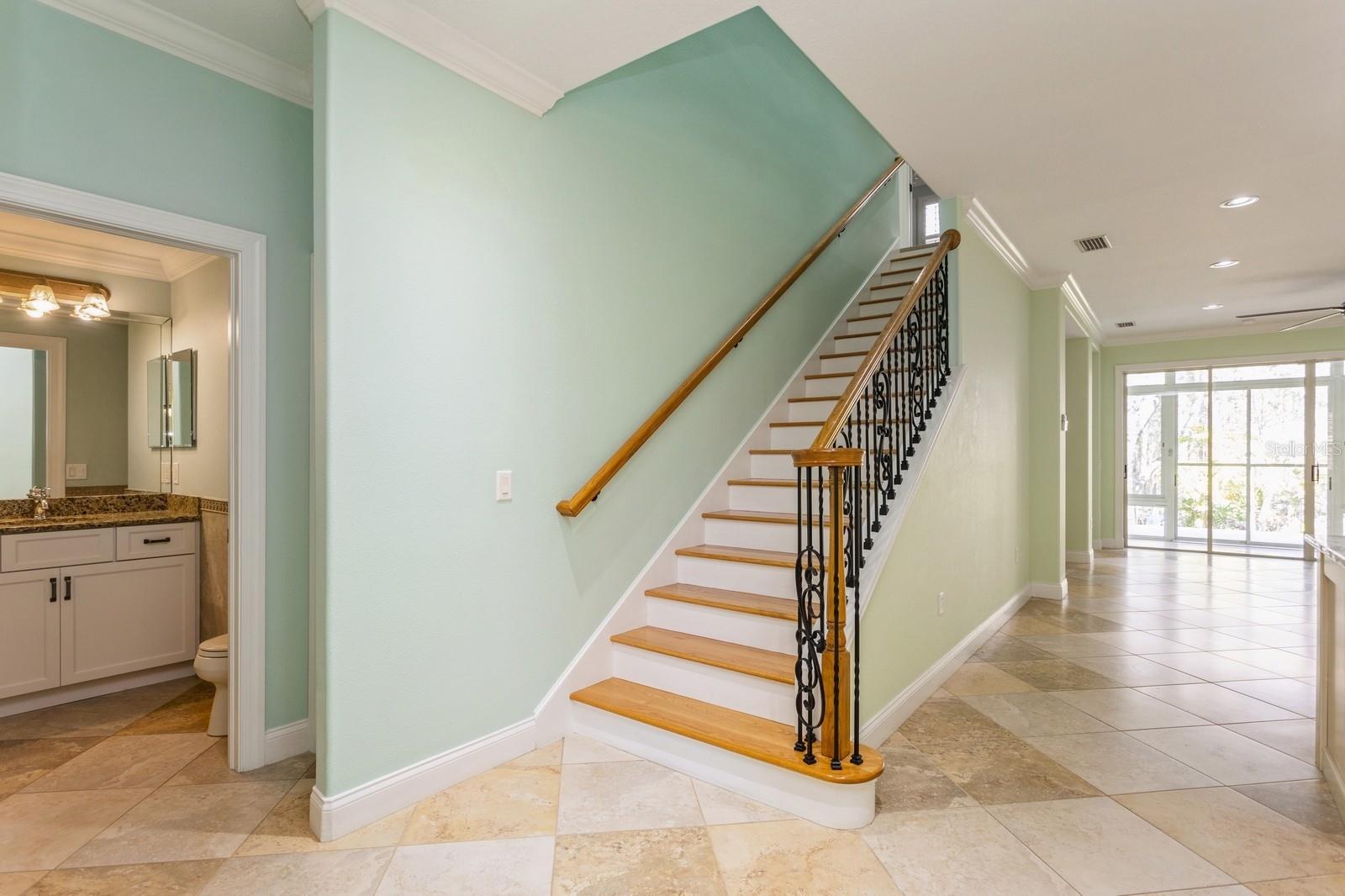 wrought iron/wood railing to 2nd floor loft