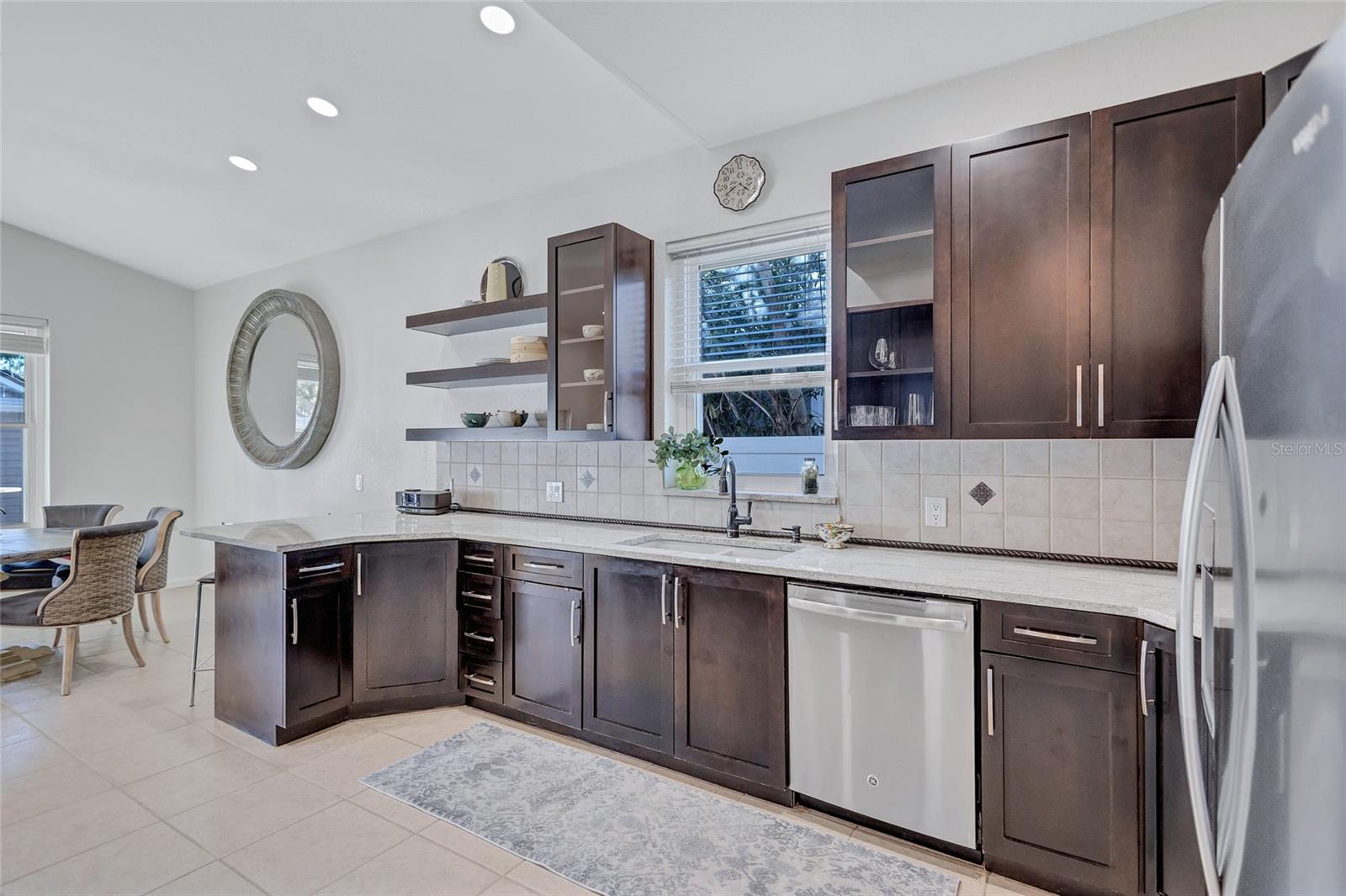 Granite Countertops, Soft-Close Cabinets, Stainless Steel Appliances