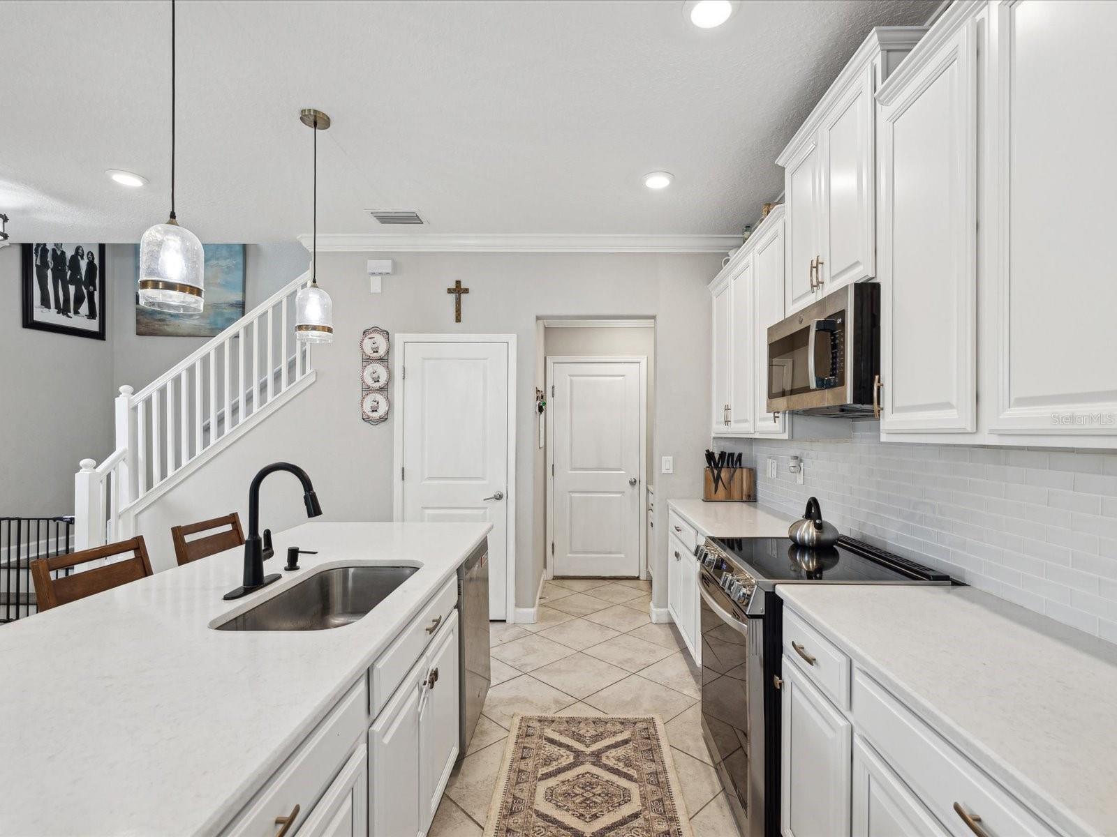 Kitchen to Closet Pantry & Garage