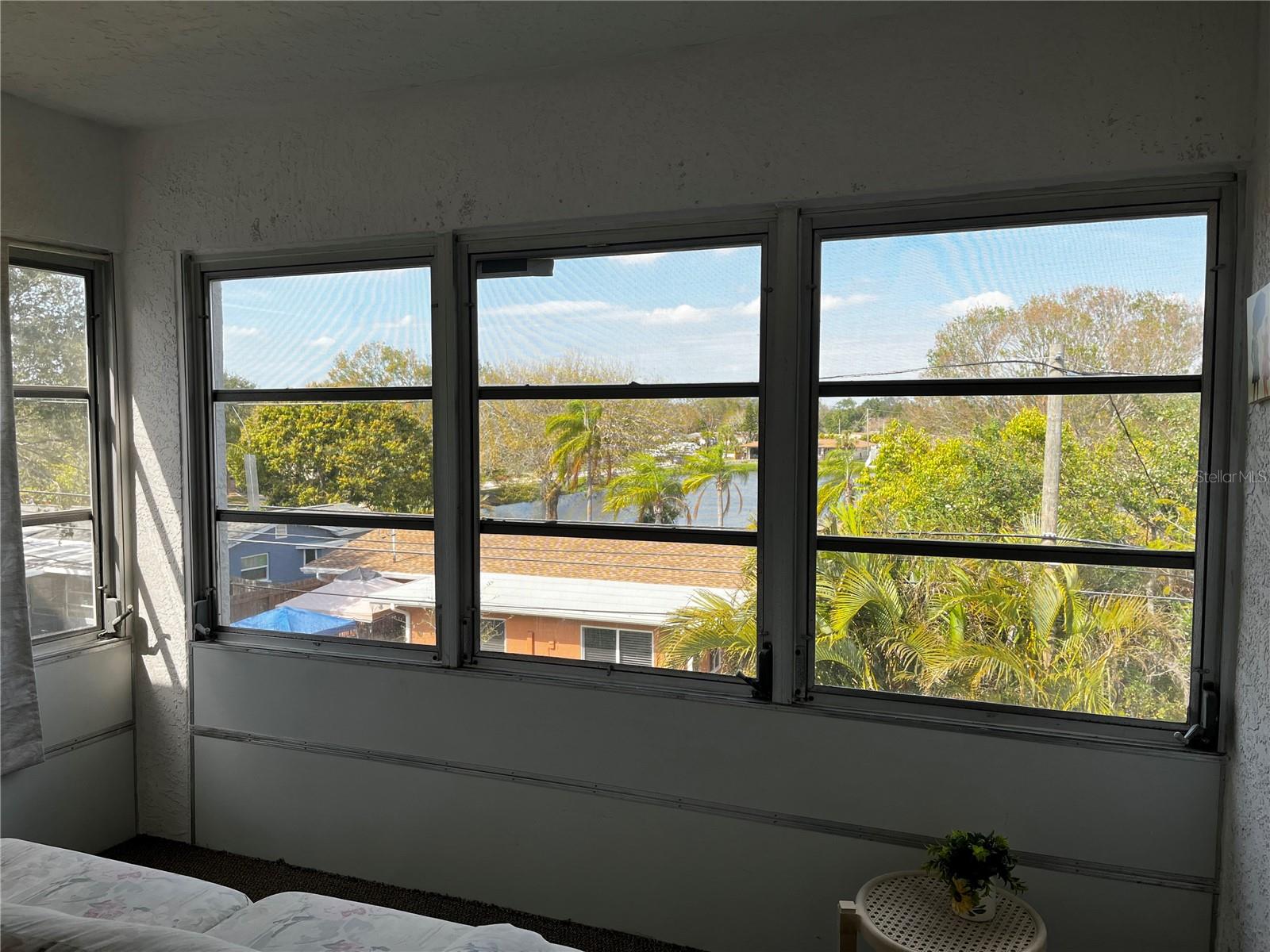 Florida room with view of pond