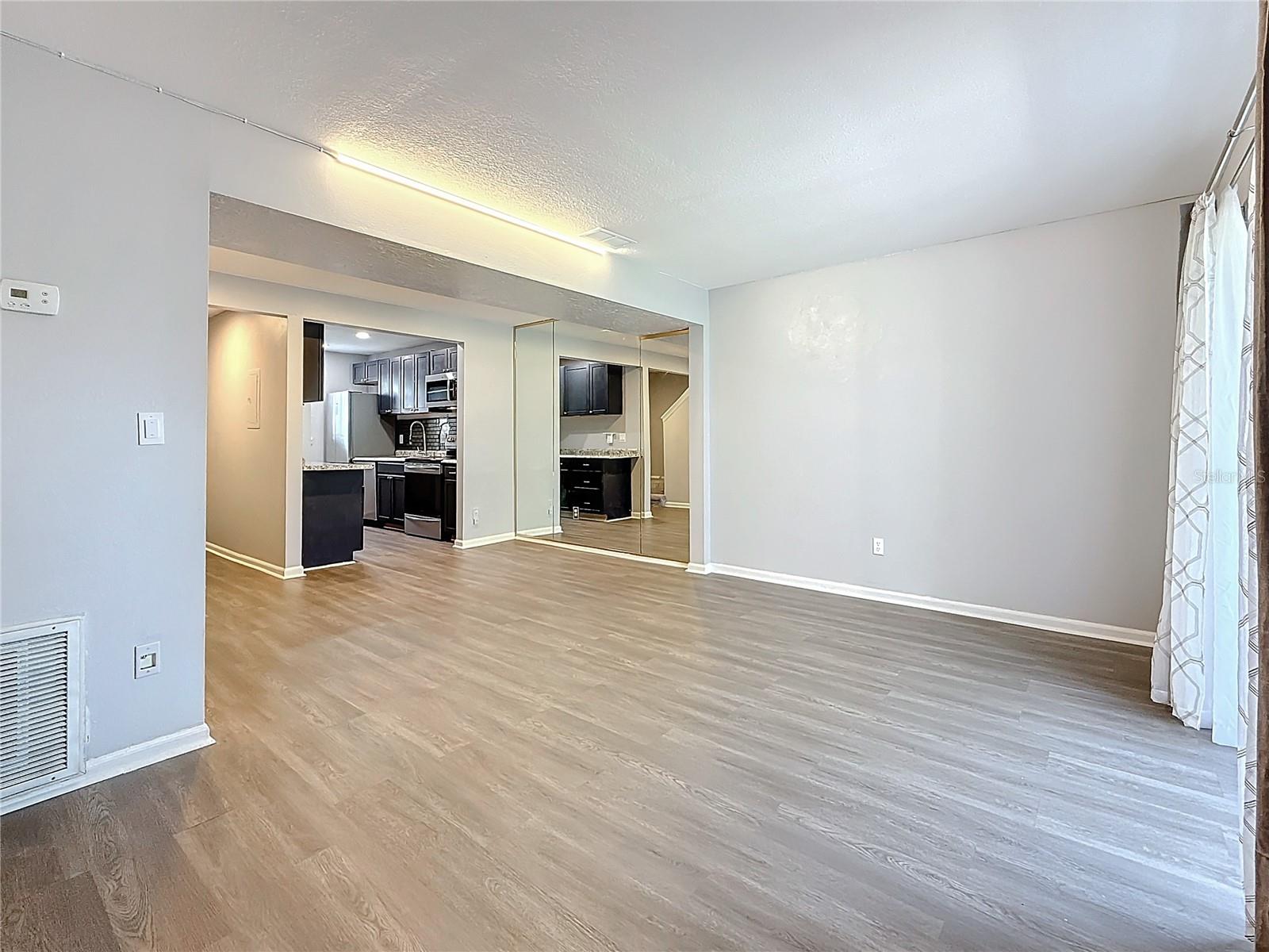 Living area looking into Dining area