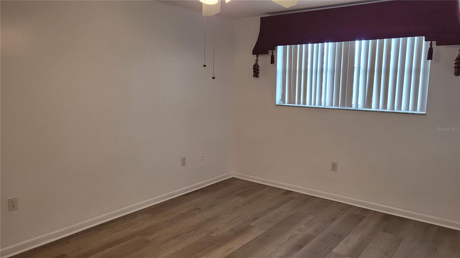 Master bedroom with luxury plank vinyl floors