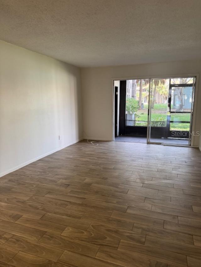 Large living room with sliders to lanai