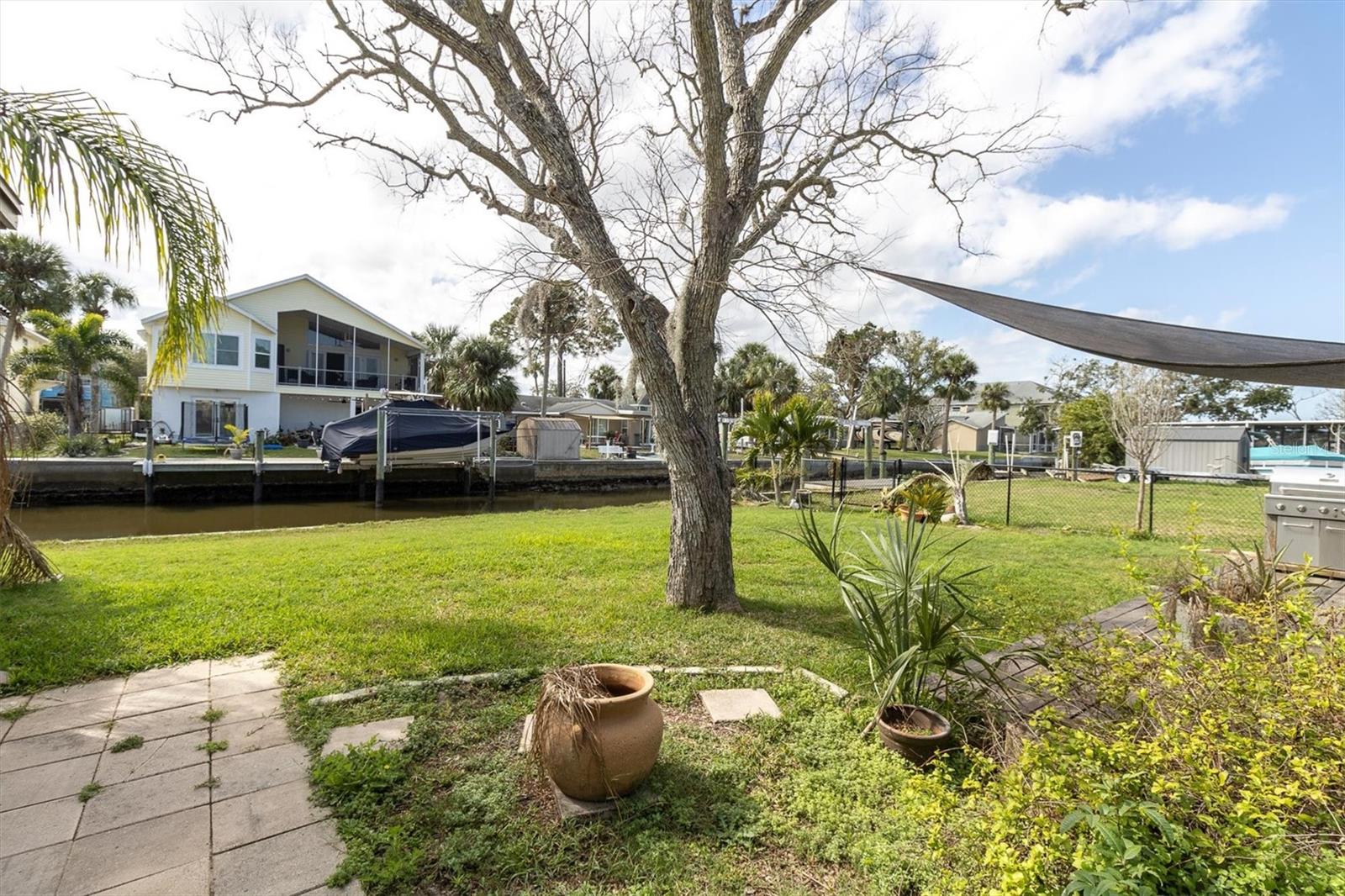 Backyard with patio with canal view