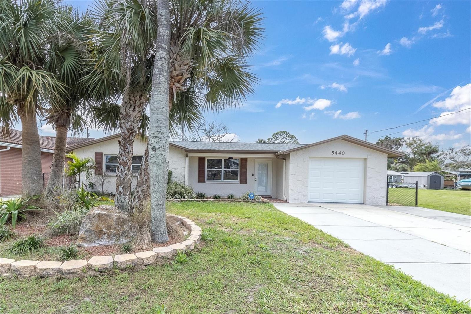 Front of the home with driveway