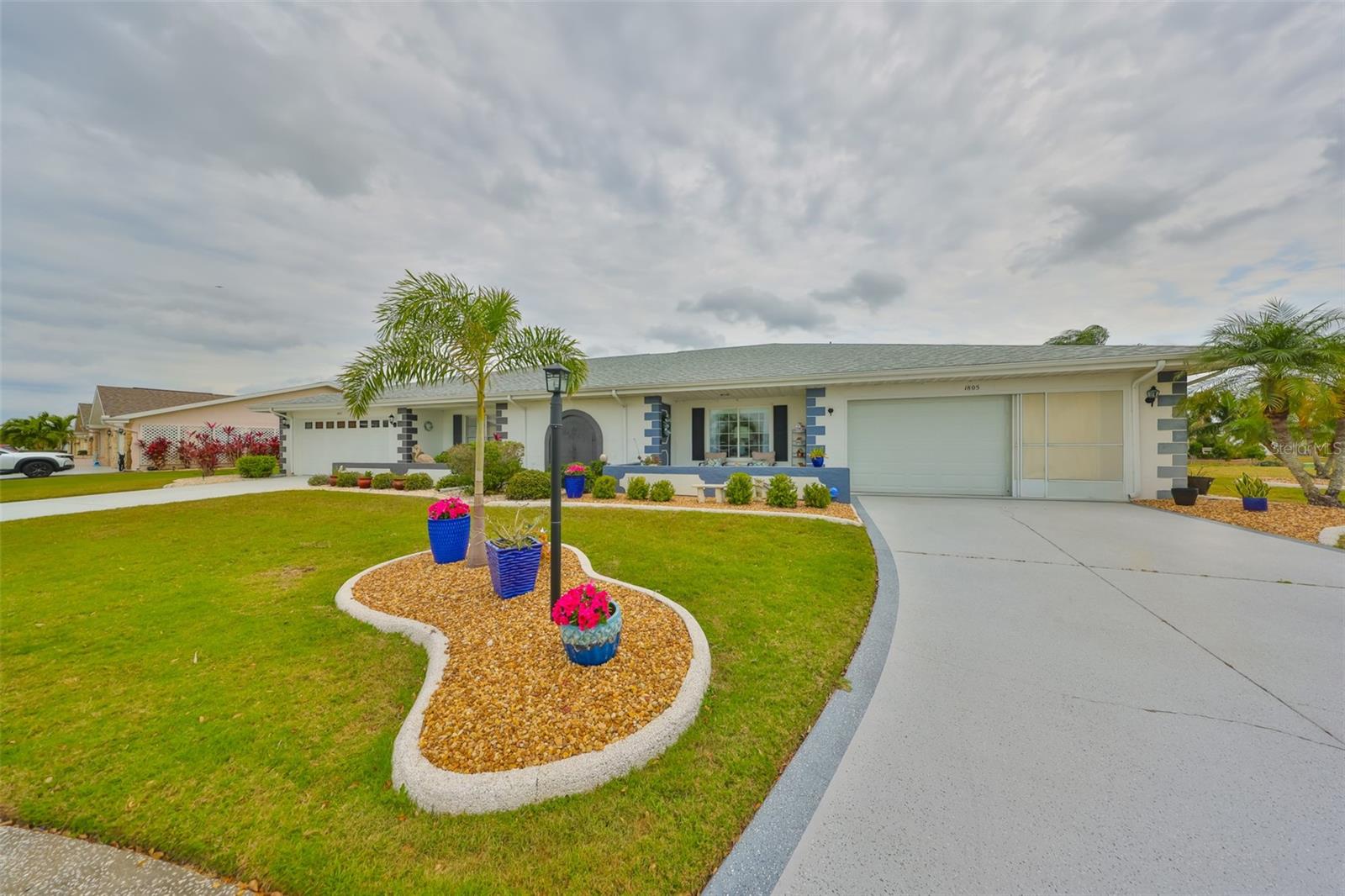 Beautifully landscaped with a double drive way.