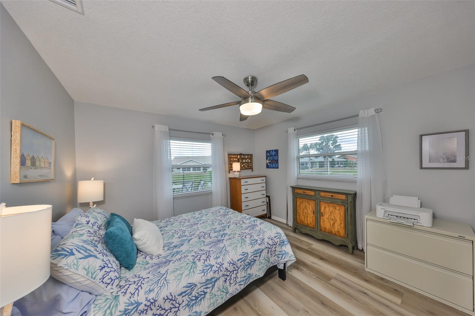 Second master suite is also spacious with new lighting and flooring (matching the rest of the home)