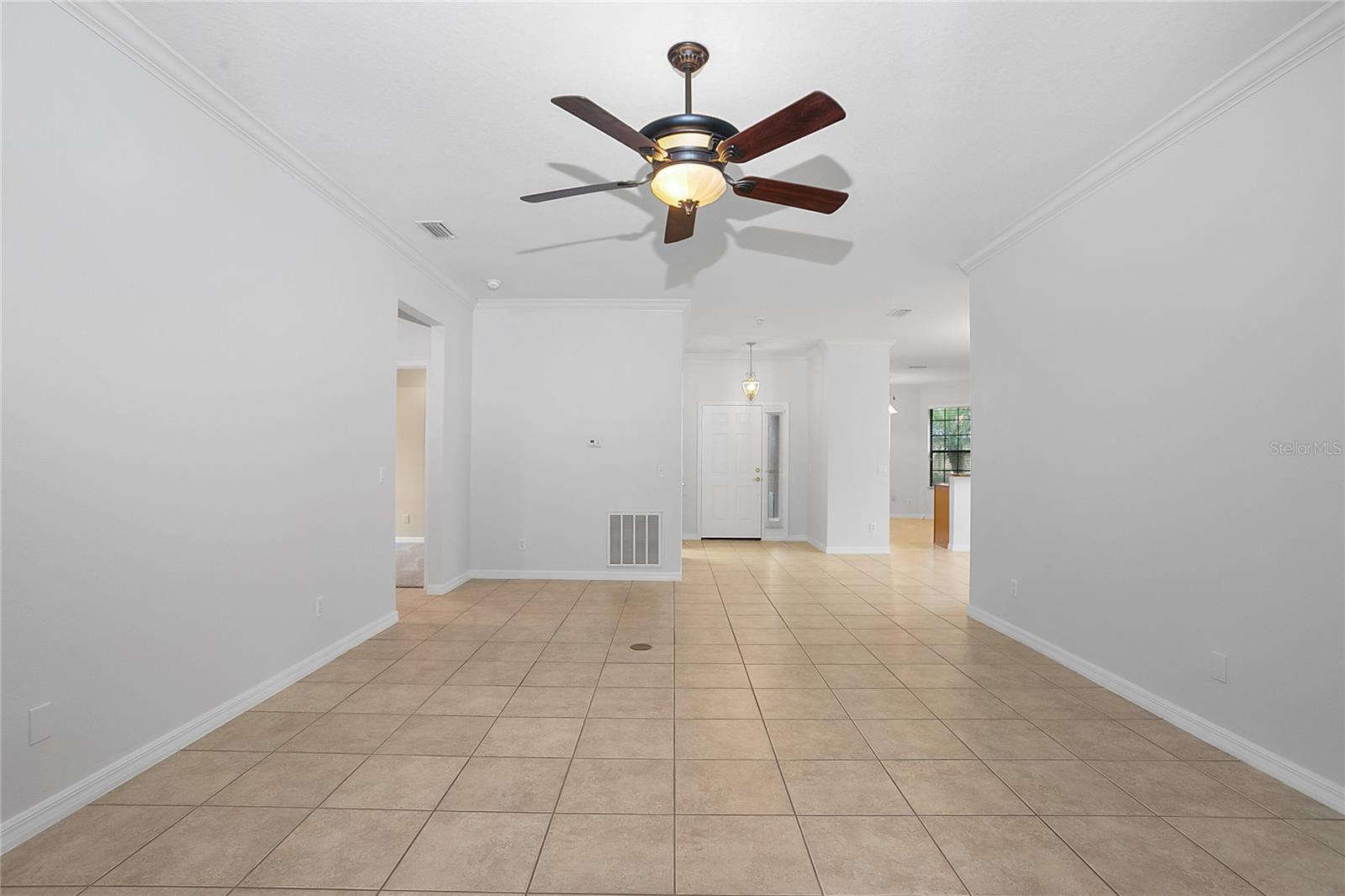 Family Room - Large Open floor plan with crowne molding