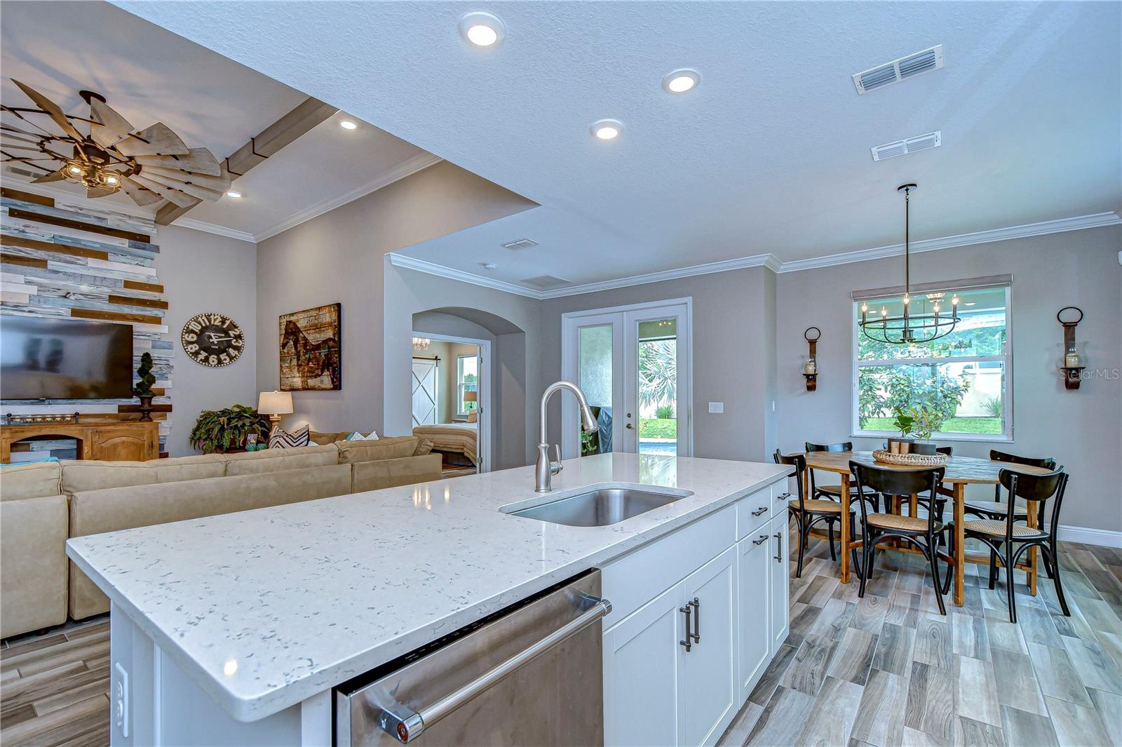 The massive kitchen island offers the perfect centerpiece for gatherings