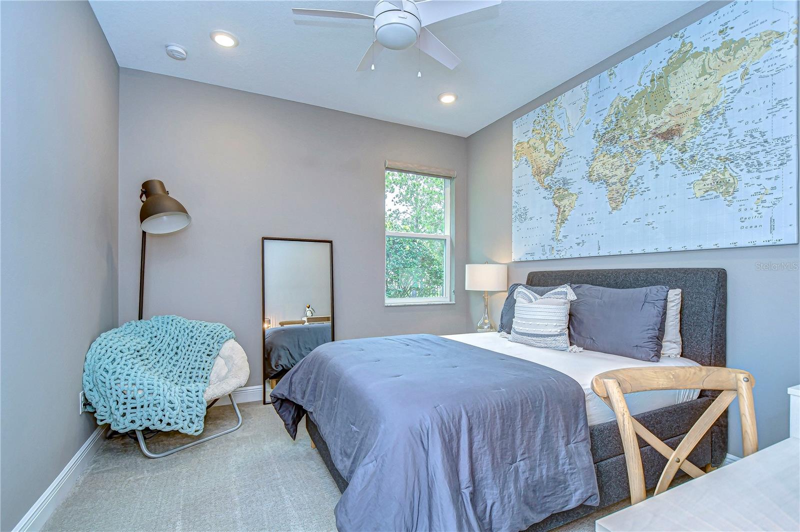 Dream, plan, and relax in this cozy 3rd bedroom where comfort meets style.