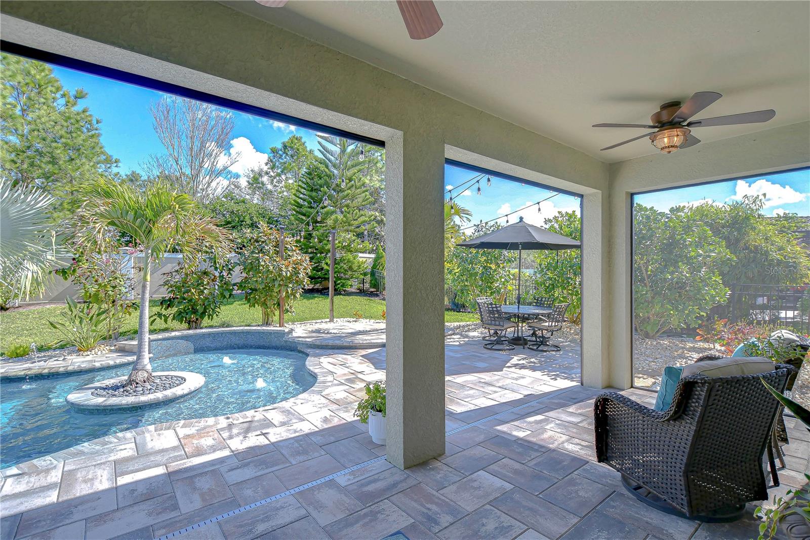 Perfect for year-round relaxation or hosting delightful gatherings under Florida’s sunny skies.