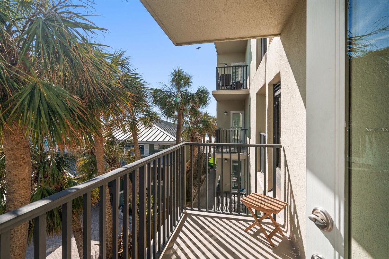 One of THREE balconies! Feel the sun's warmth as you catch a few rays in privacy!