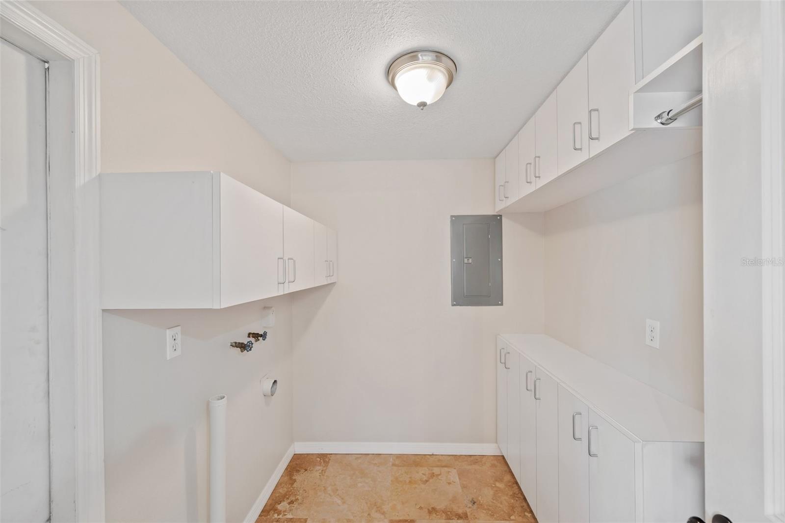 Laundry/Utility Room with additional cabinet storage