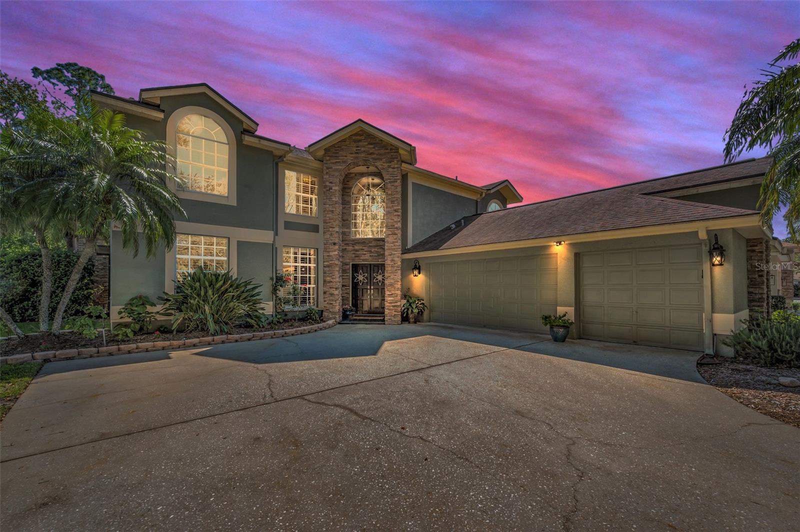 Front of home and 3 car garage