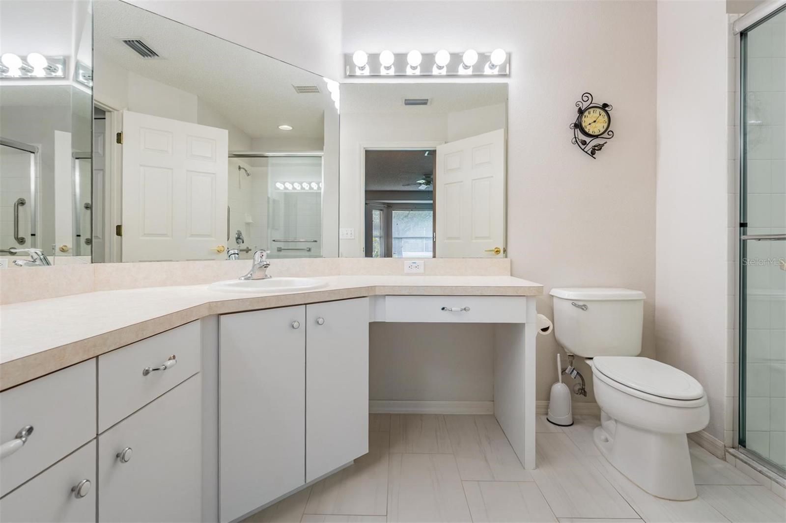 Master bathroom provides additional vanity storage