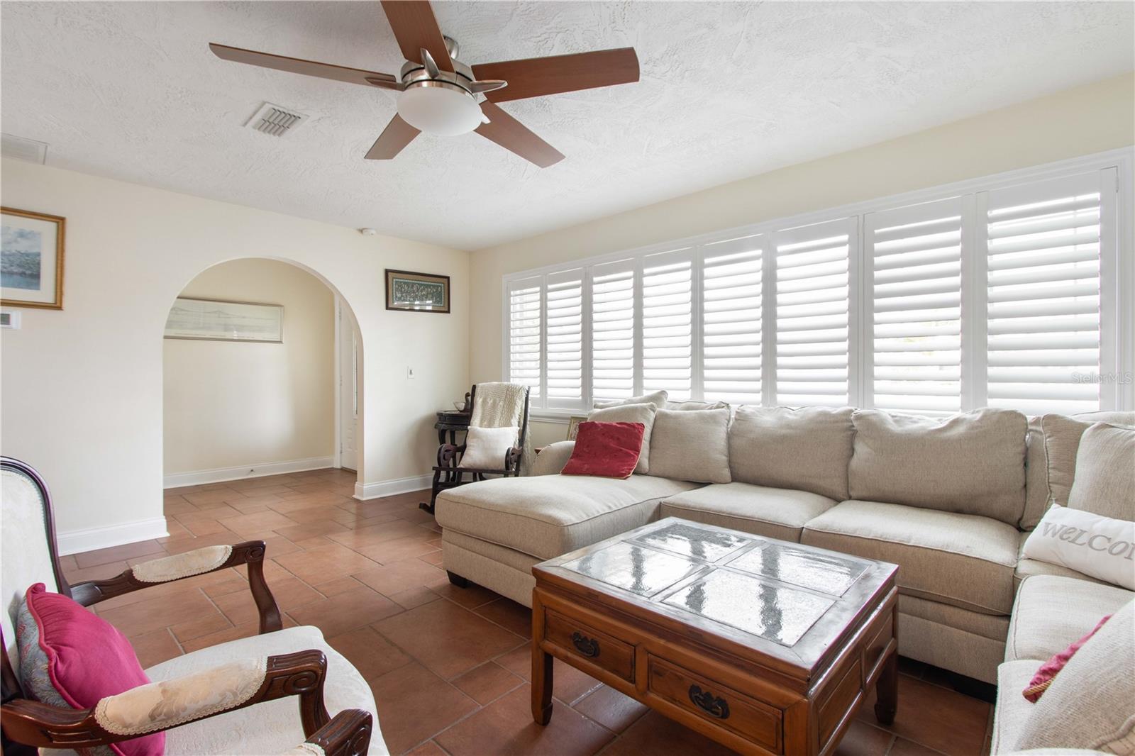 Front living room with plantation shutters