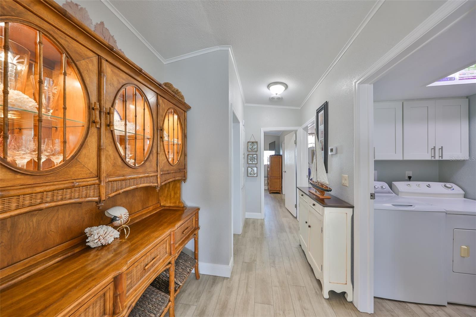 14. Hallway leading to bedrooms and laundry room