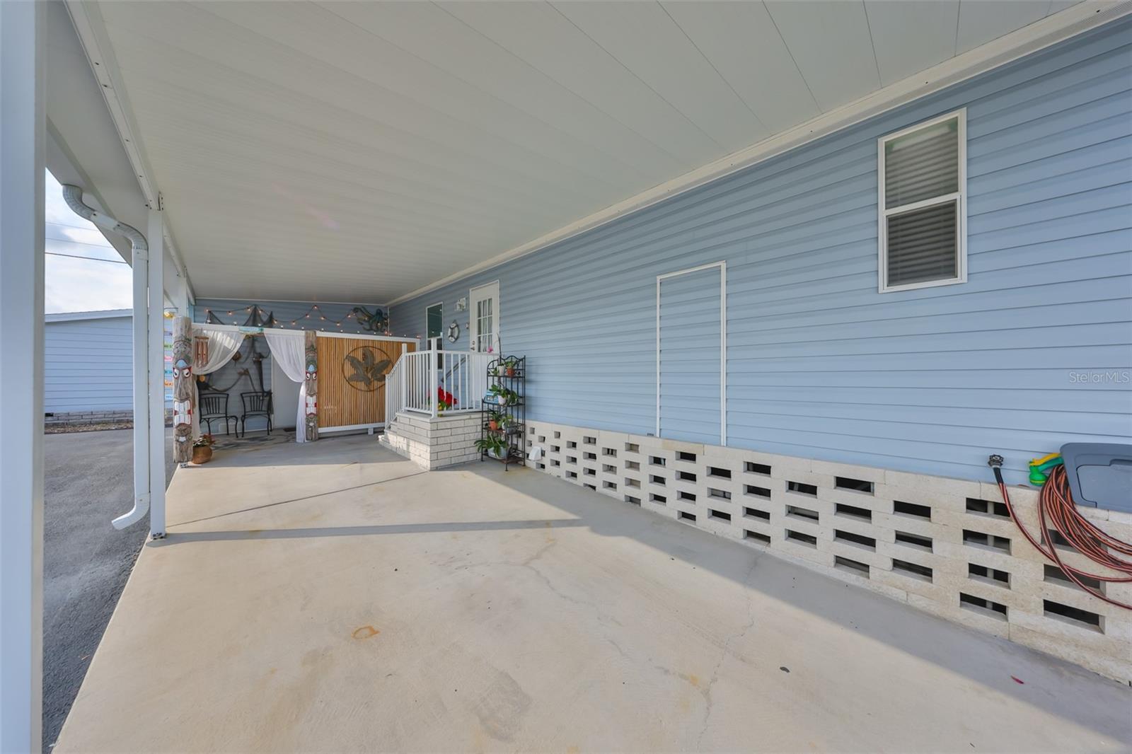 28. Large Carport with Private Enclosure