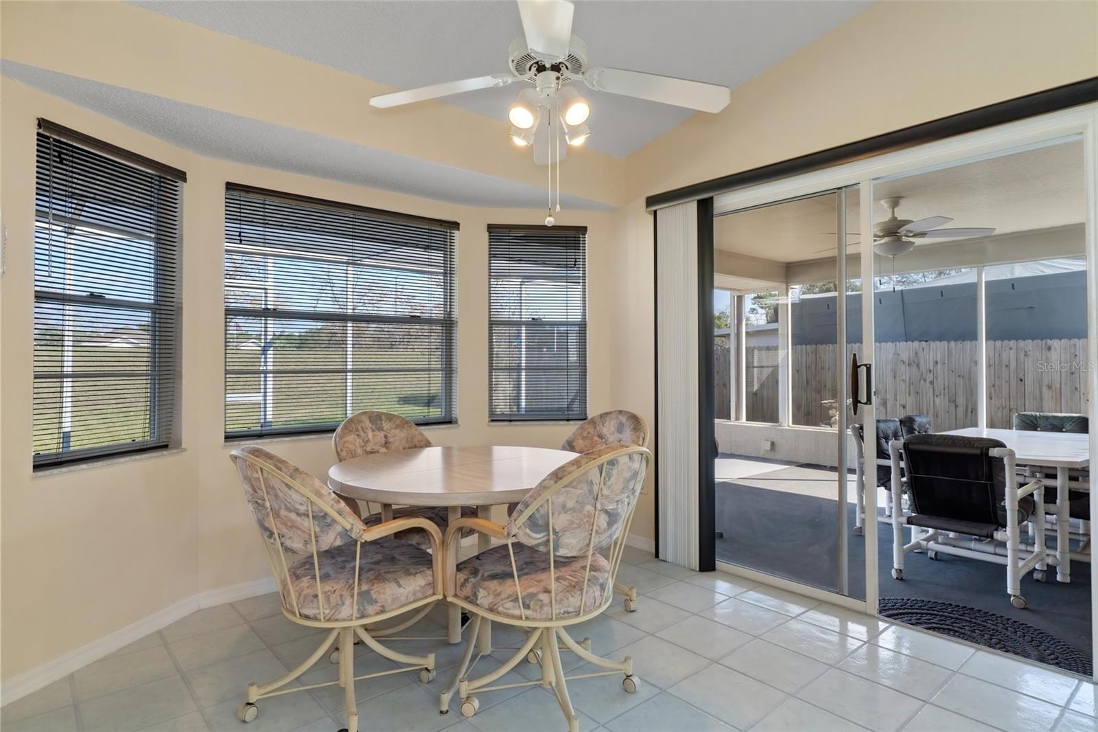 Kitchen with Bay Window and Sliders to Lanai