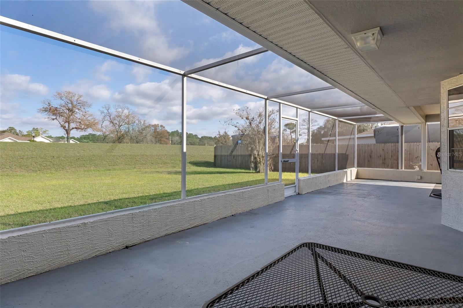 Spacious Screened Lanai Overlooking Backyard with NO REAR NEIGHBORS