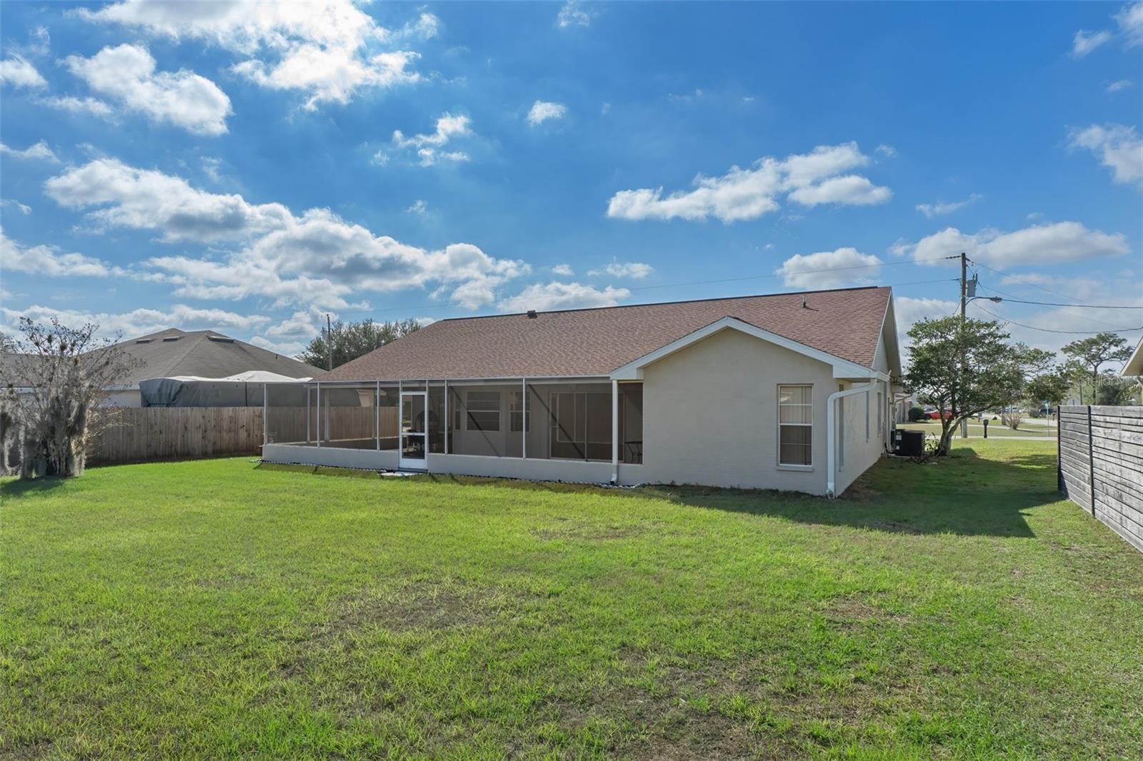 Rear of Home with Spacious Backyard