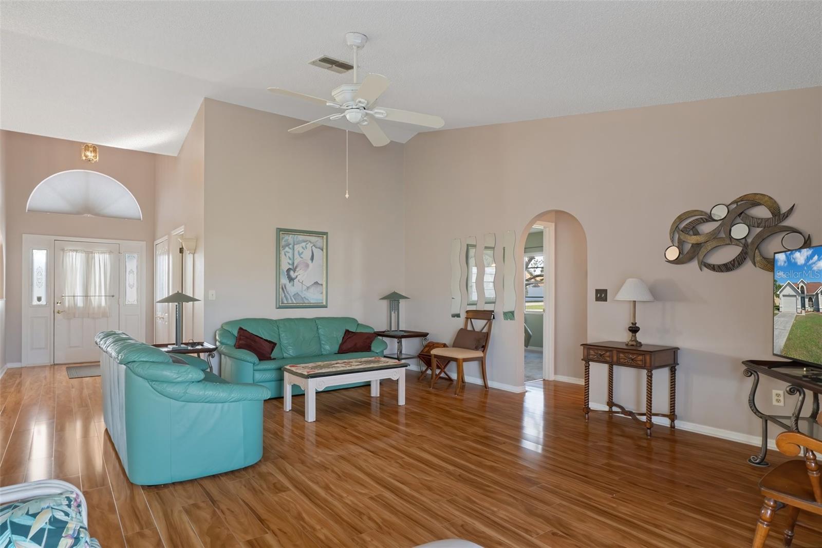 Living Room with Vaulted Ceiling and Newer Flooring