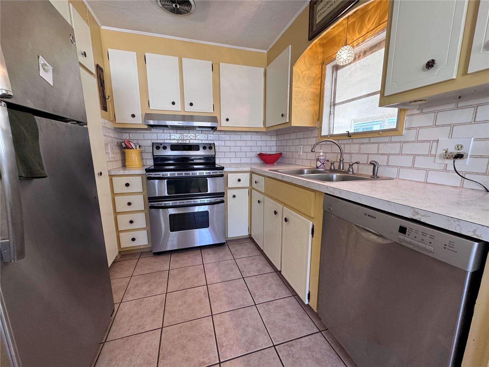 Kitchen with stainless steel appliances