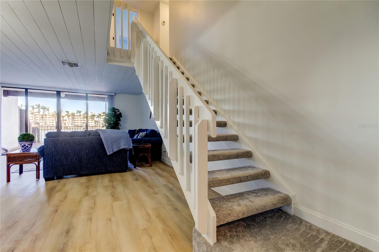 Stairs to 3 bedrooms on 2nd level