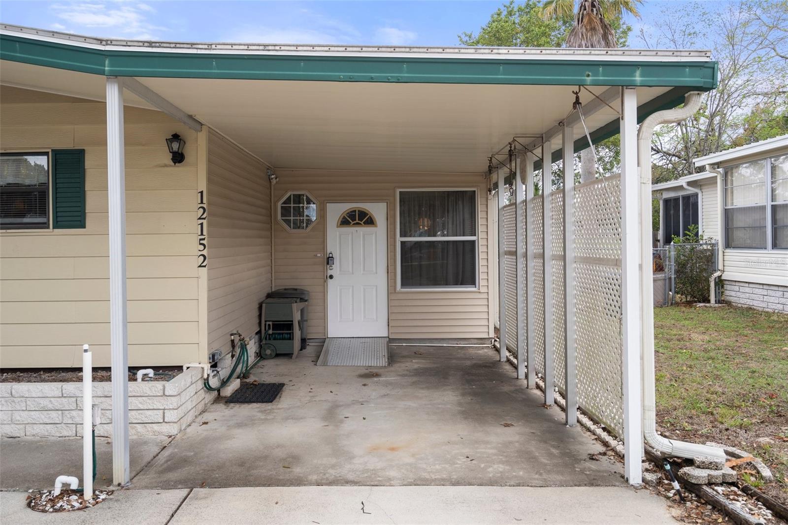 Covered Carport with Entrance