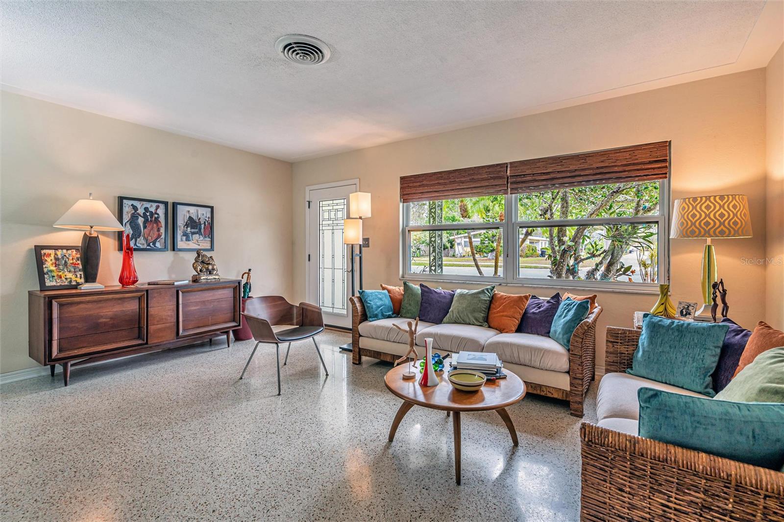 Living room with gleaming terrazzo floors