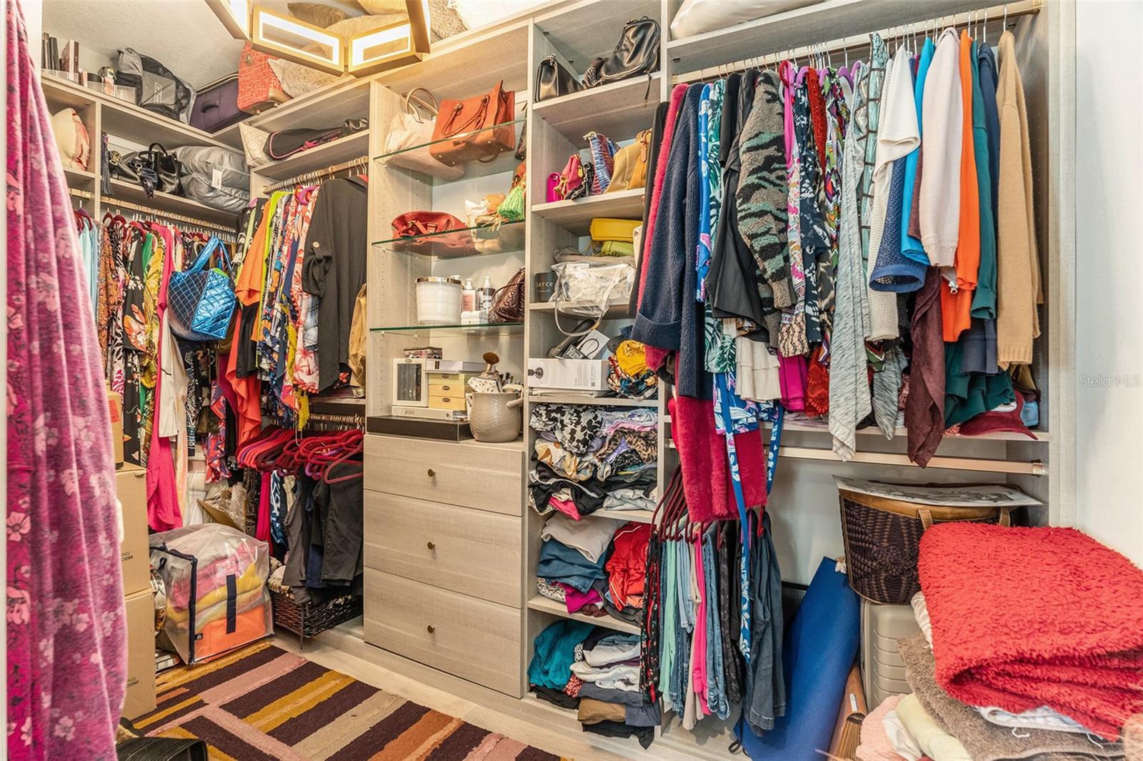 --  One of Two Primary Walk-In Closets w/ Custom Designed Built-Ins and Lighting  --