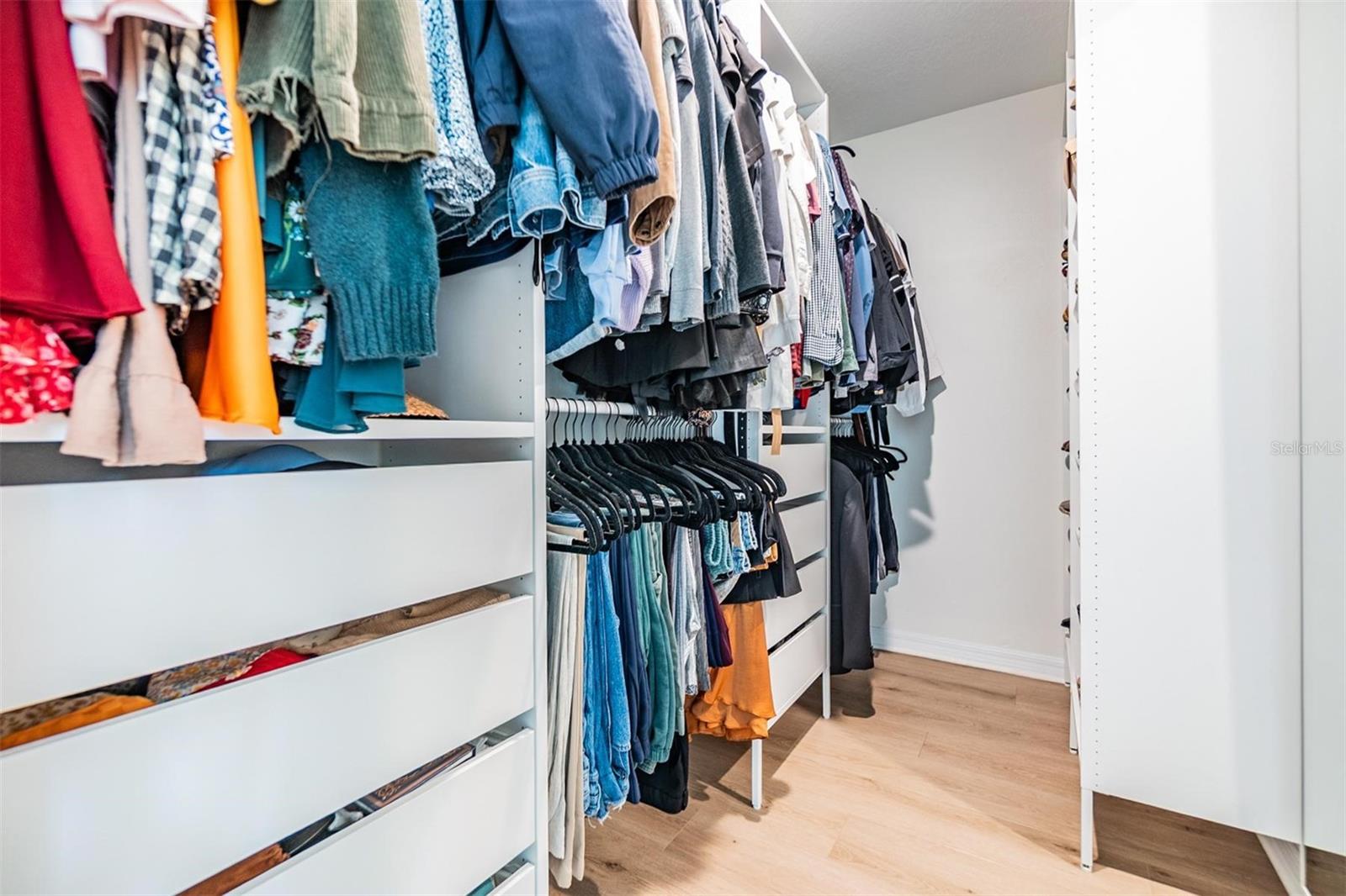 custom primary closet built ins