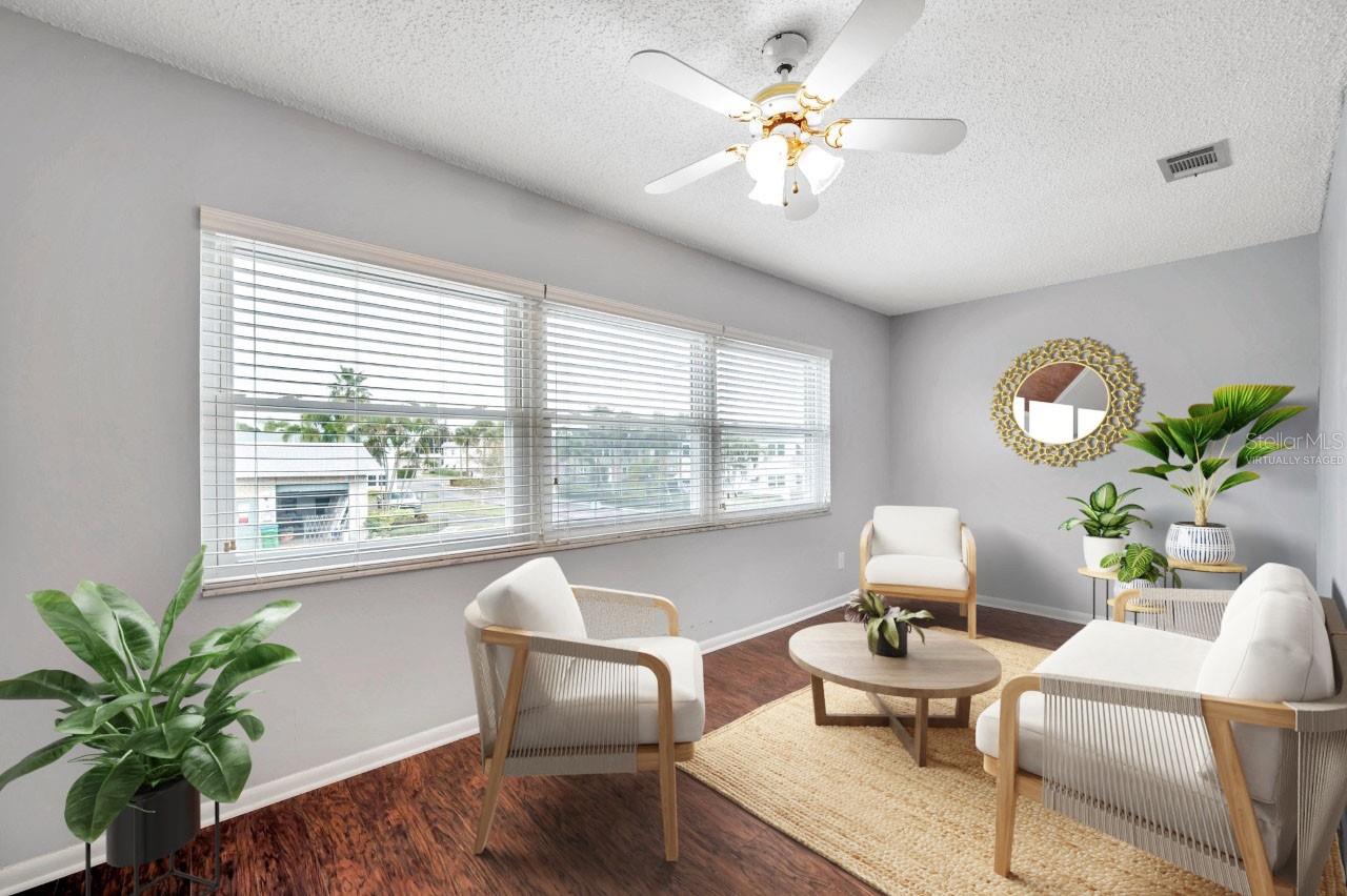 Perhaps you will enjoy this room by just sipping your coffee in the morning and relaxing! Virtually staged