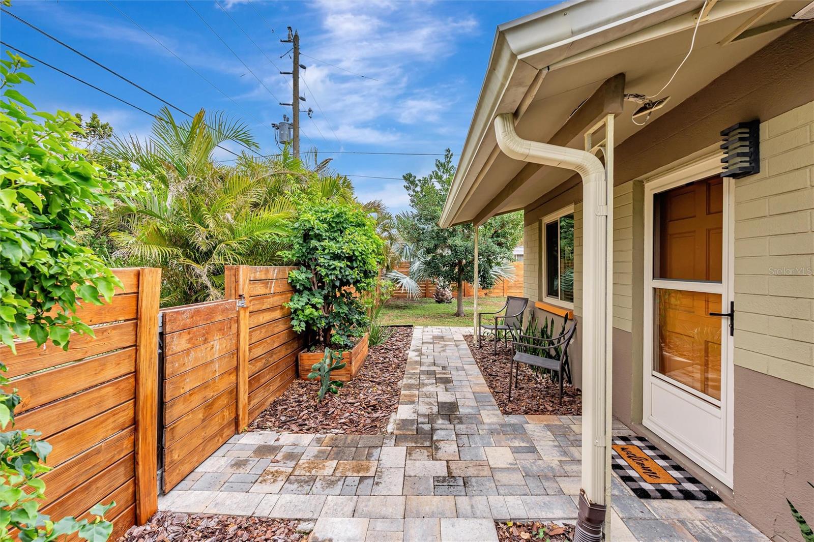 Walkway to backyard from front door