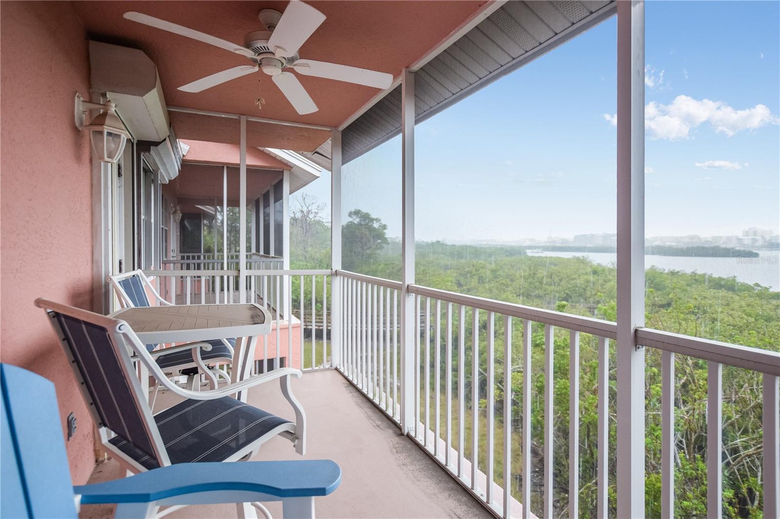 View from upstairs balcony, fully screened in with ceiling fan for maximum comfort of the sunset!