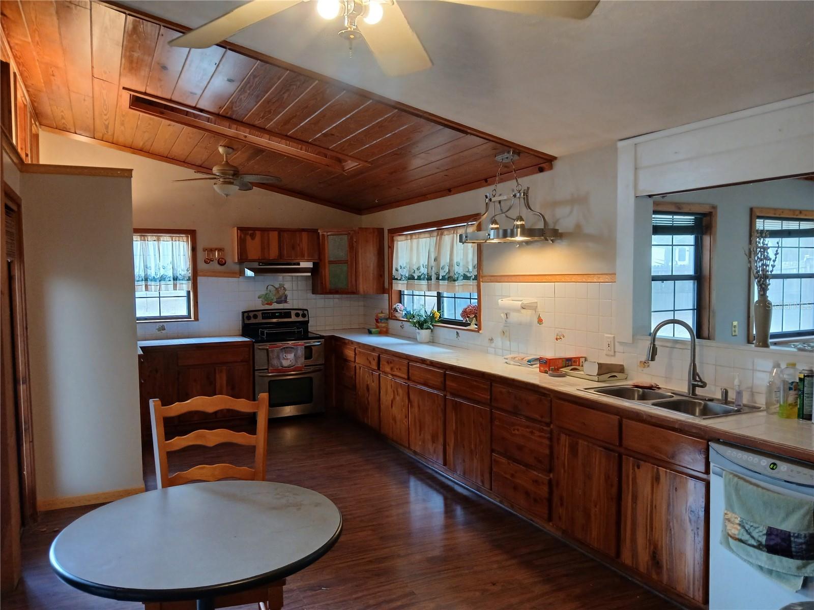 Long kitchen. Dining area at one end