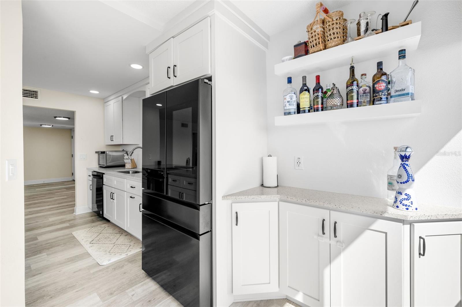 Kitchen with separate area for bar or coffee bar