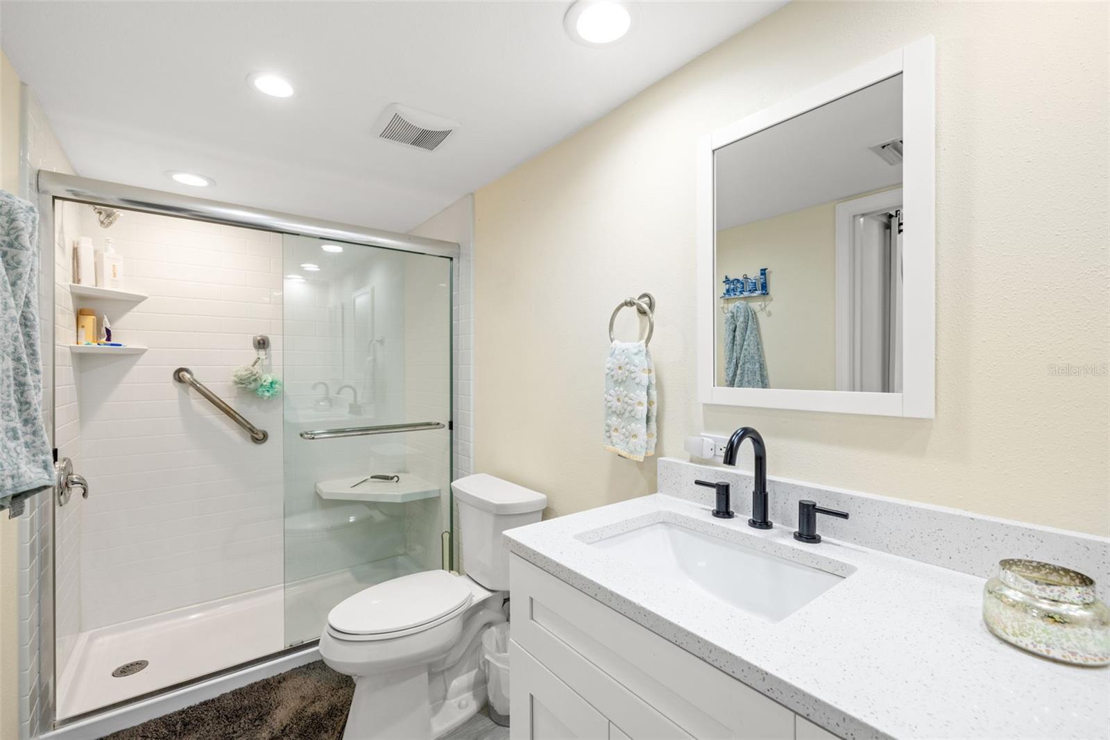 Primary bath with white subway tile