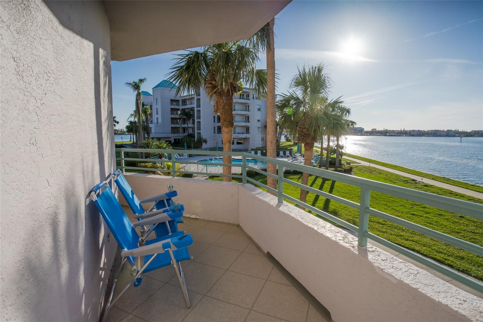 Front Balcony Overlooking Water & Pool!