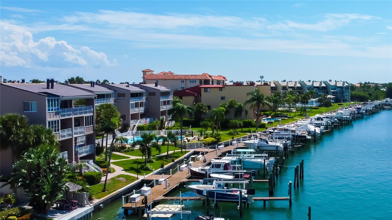 Picturesque waterfront living along the Grand Canal, with stunning views of Shell Island’s beaches and the Gulf—where serenity meets coastal charm.