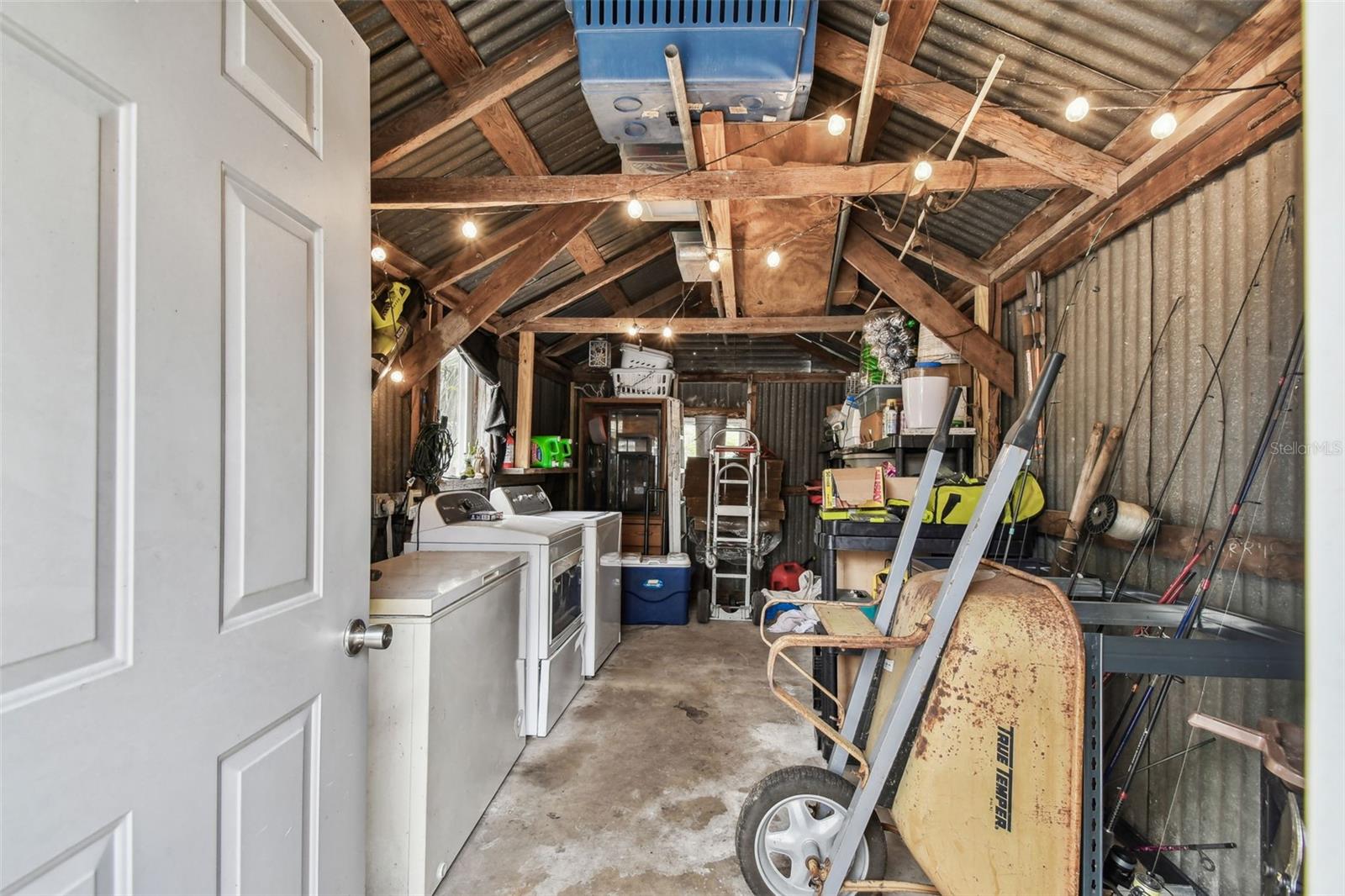 Spacious Storage Shed with Laundry Hookups