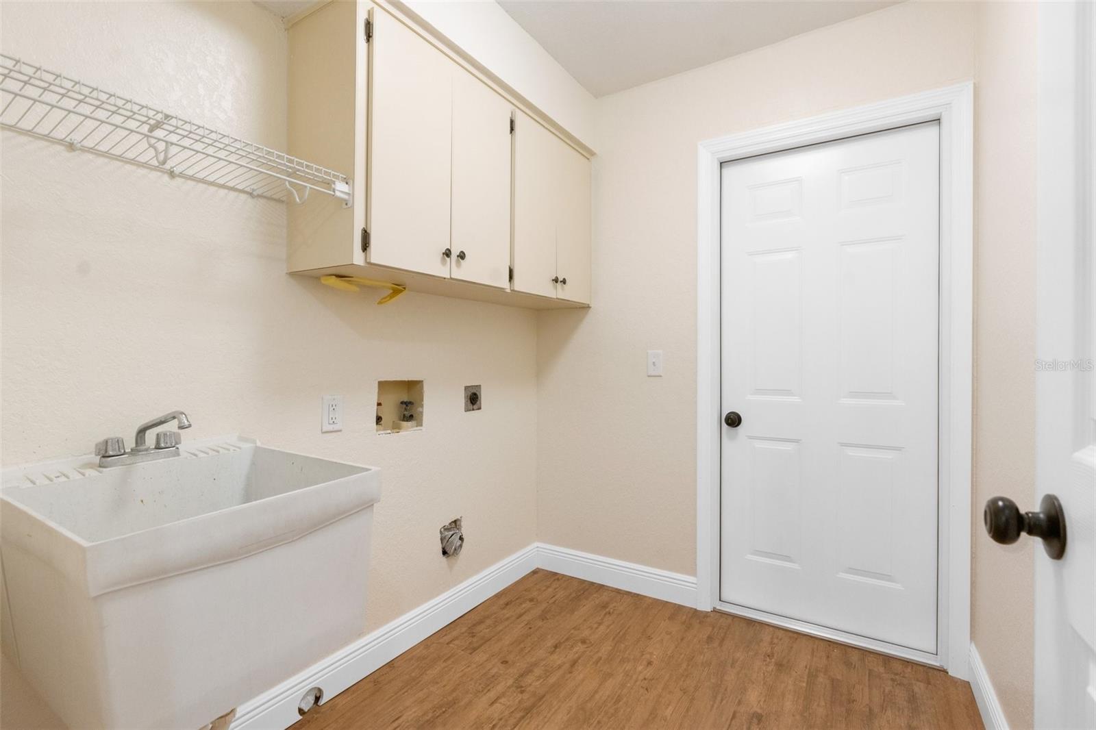 Inside Laundry Room with tub!