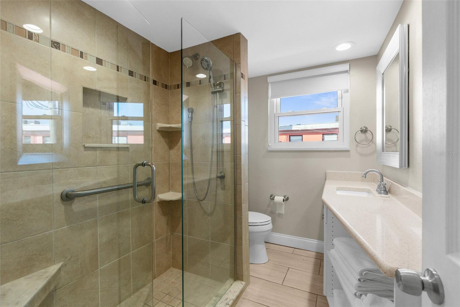 Updated bathroom with walk-in-shower.