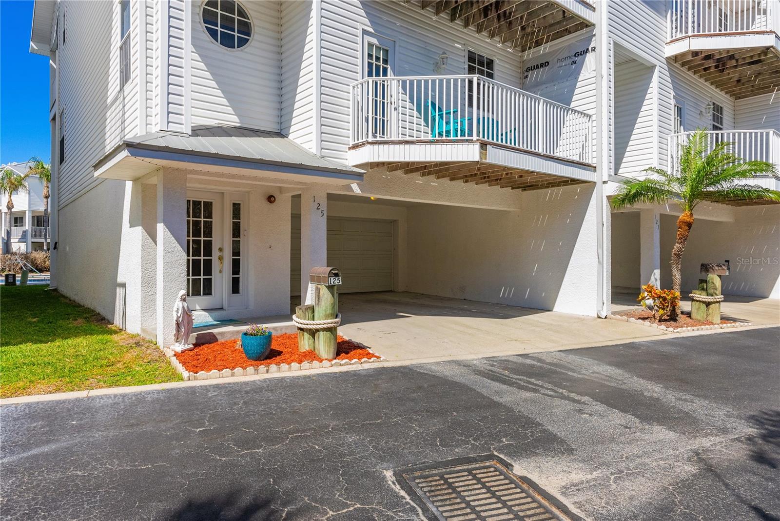 2 Car Garage + 2 Carport Spaces