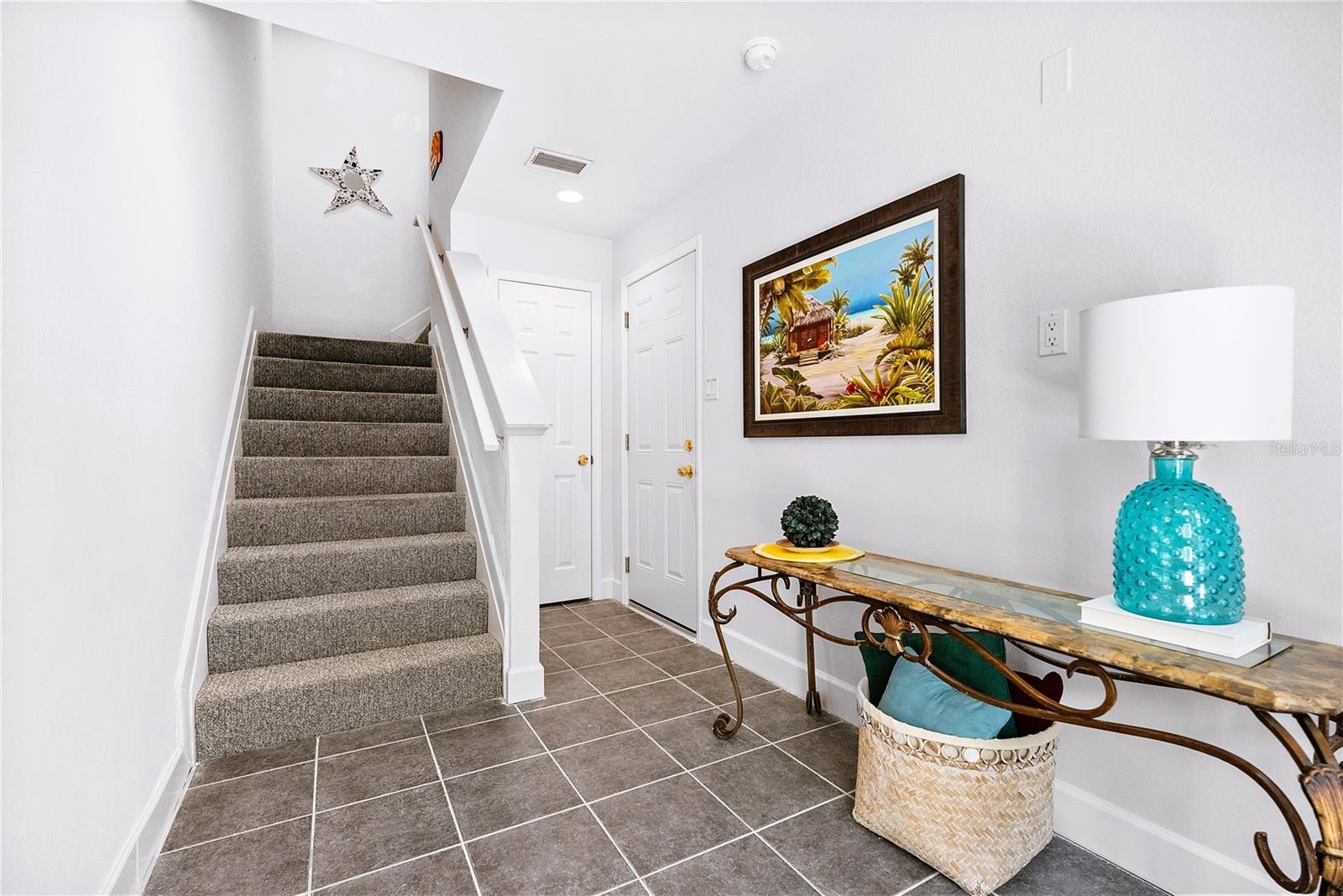 Garage door leading into foyer