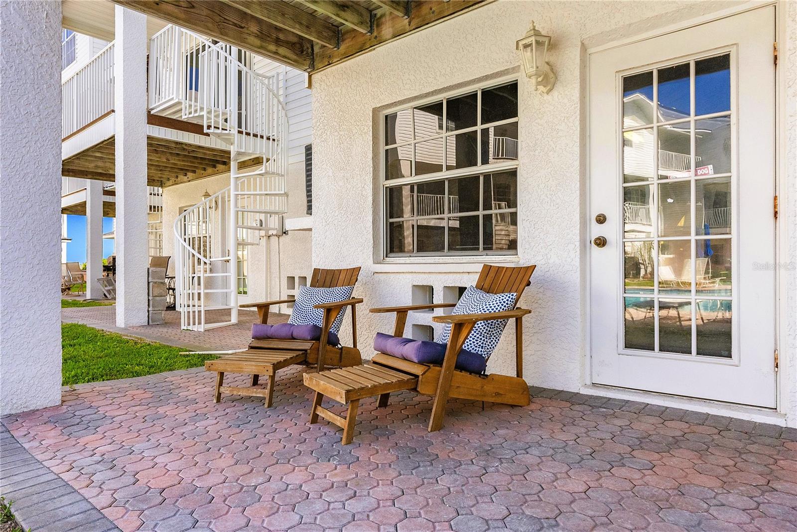 Backside patio facing pool