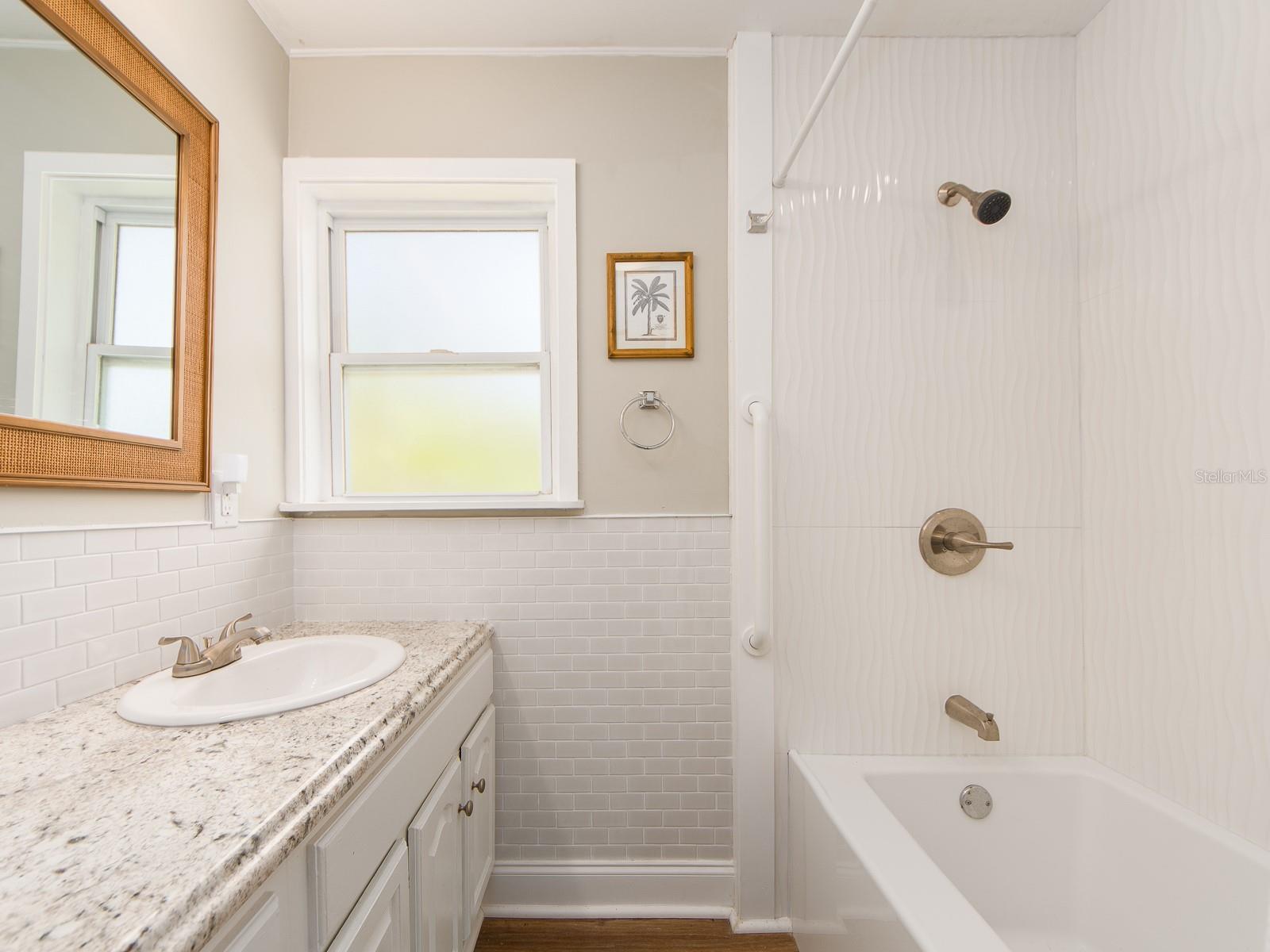 Tub with shower